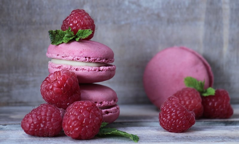 Macarons and raspberries
